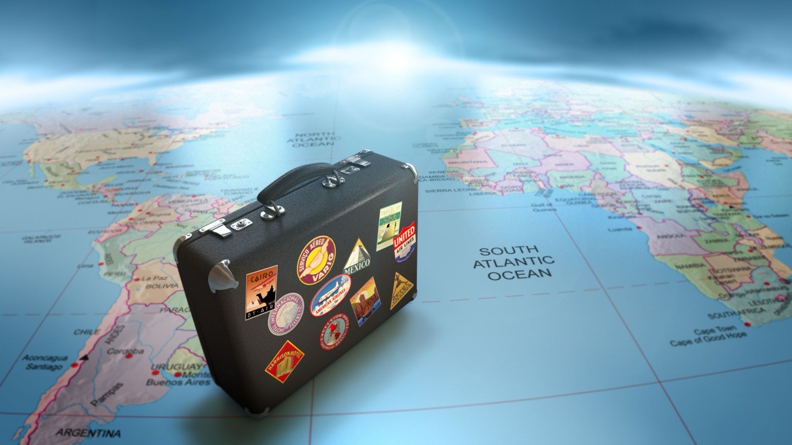 Suitcase on a world map — international medical travel